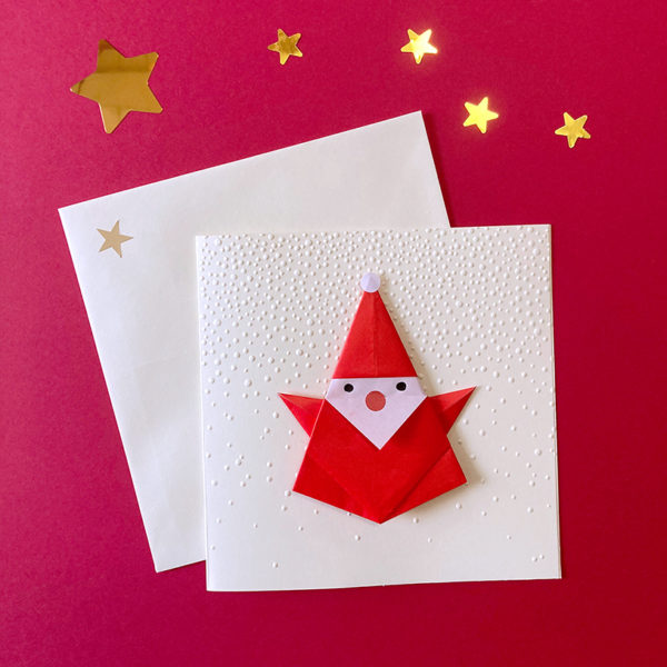 Carte embossage flocons Père-Noël